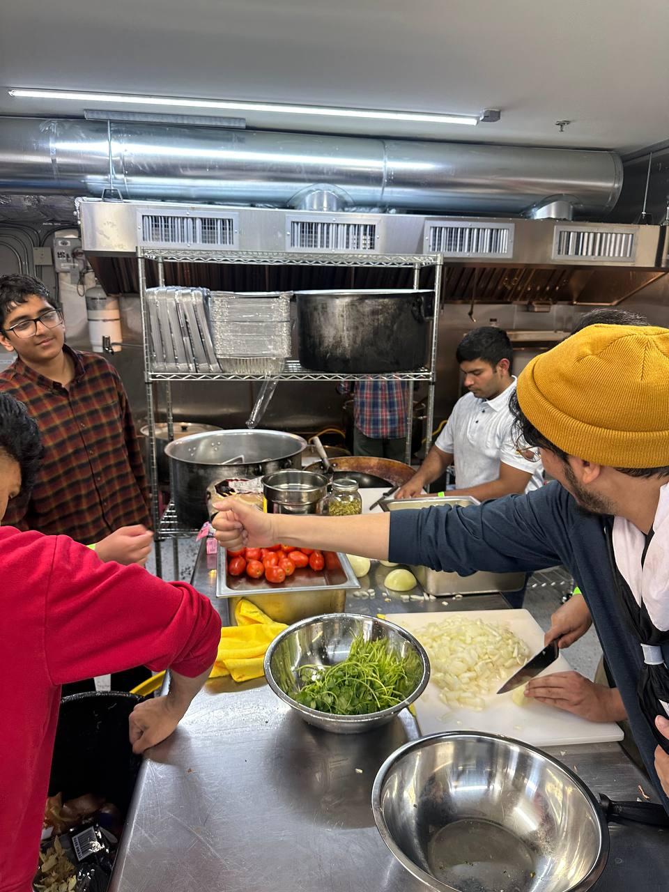 Volunteer kitchen service at a community gathering