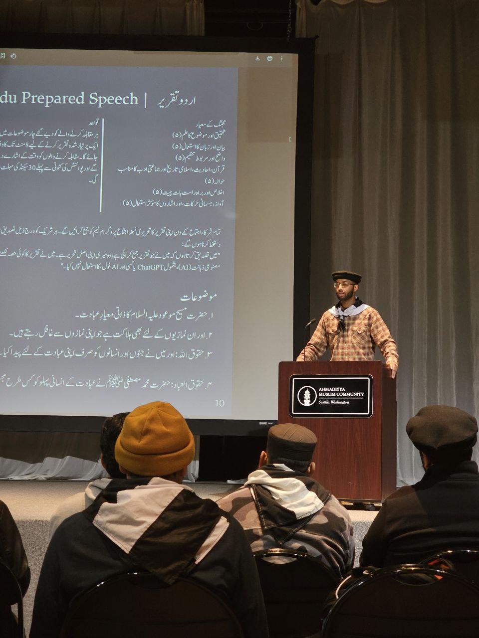 Khadim delivering speech competition entry at Ijtema
